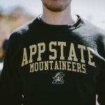 Male torso wearing an Appalachian State University sweatshirt
