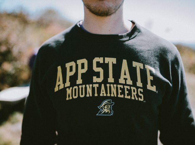 Male torso wearing an Appalachian State University sweatshirt