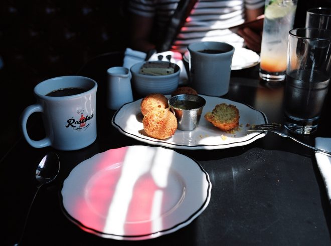 Rosebud Diner in Davis Square in Somerville with light highlighting hush puppy balls.