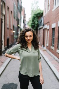 Brianna holds hand to hip for sassy but professional portrait.