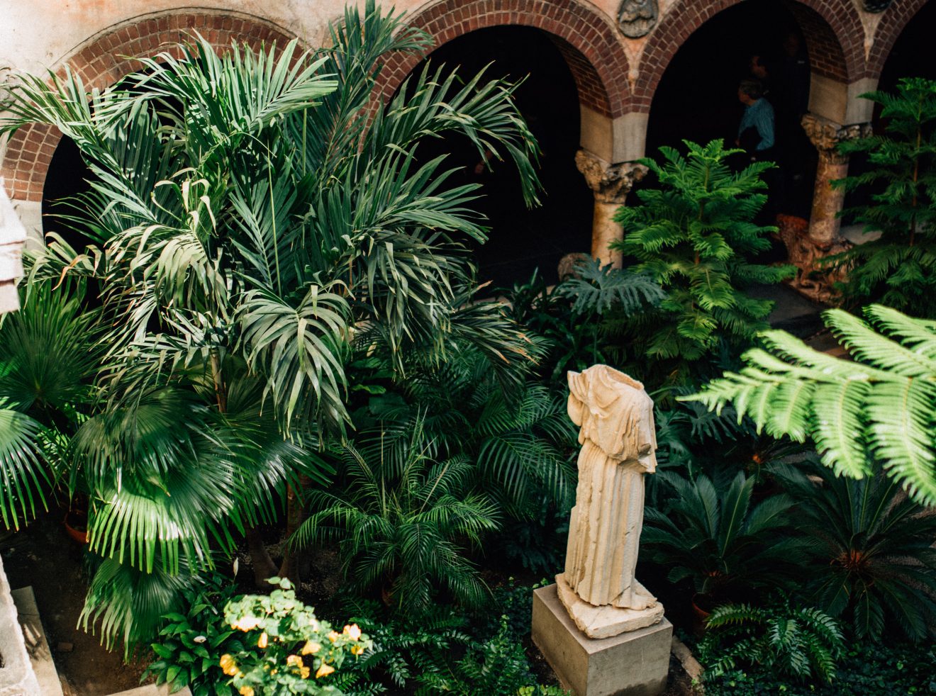 Angular side view of the Isabella Stewart Gardner Museum courtyard