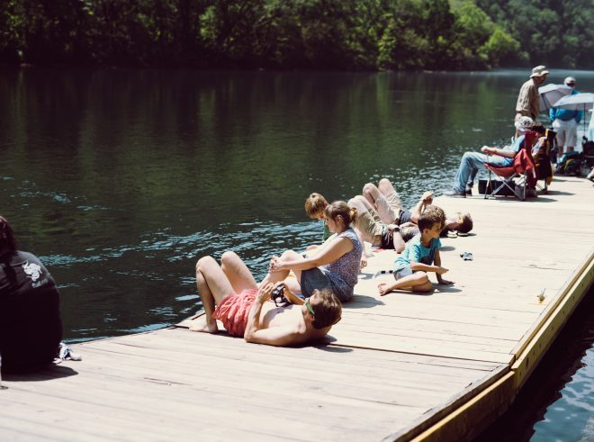 Viewers find the most comfortable position to watch the eclipse.