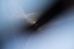 Following totality, the moon can be seen exiting the path of sunlight.