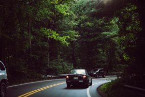 A car takes a sharp turn on the trip back to Boone.